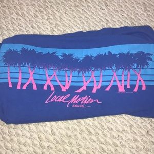 Local motion blue tee
